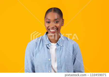 Portrait Of Attractive Young African American Lady Over Yellow Background 110459071