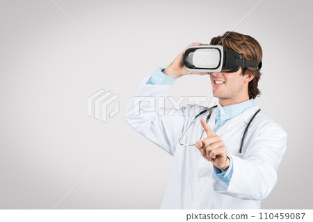 Doctor man experiencing VR technology, futuristic healthcare Doctor man experiencing VR technology, futuristic healthcare 110459087