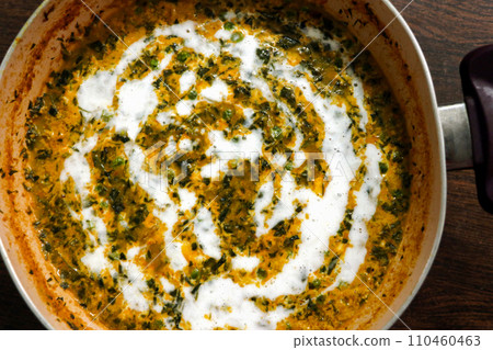 Methi Malai Matar, popular indian vegetarian main course served in Karahi Methi Malai Matar, popular indian vegetarian main course served in Karahi 110460463