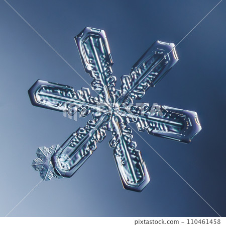 Natural snowflake crystal close-up macro photo 110461458