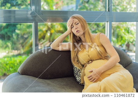 Expectant woman experiences discomfort, feeling unwell during pregnancy Expectant woman experiences discomfort, feeling unwell during pregnancy 110461872