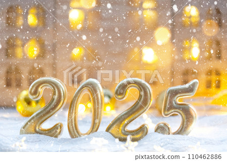 Golden figures number 2025 against the background of cozy windows of a house with warm light with festive decor of stars,snow and garlands. Greeting card, Happy New Year, cozy home Golden figures number 2025 against the background of cozy windows of a house with warm light with festive decor of stars,snow and garlands. Greeting card, Happy New Year, cozy home 110462886