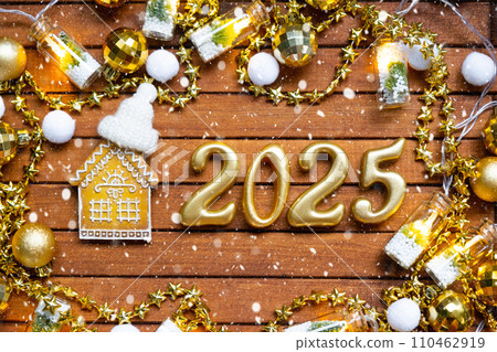 House key with tiny figure of home mock up on festive brown wooden background, lights of garlands. New Year 2025 wooden letters, greeting card. Purchase, construction, relocation, mortgage, insurance House key with tiny figure of home mock up on festive brown wooden background, lights of garlands. New Year 2025 wooden letters, greeting card. Purchase, construction, relocation, mortgage, insurance 110462919