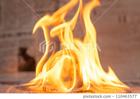 Glass globe on fire. Planet Earth Burning. Global Warming and Climate Change Concept. 110463577