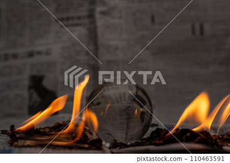 Glass globe on fire. Planet Earth Burning. Global Warming and Climate Change Concept. 110463591