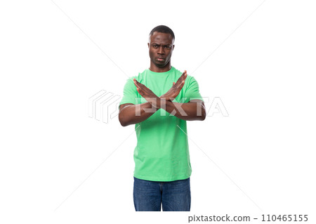 young african man crossed his arms in front of him in disagreement young african man crossed his arms in front of him in disagreement 110465155