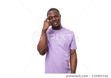 close-up portrait of a young pensive african man in a lilac t-shirt worried close-up portrait of a young pensive african man in a lilac t-shirt worried 110465182