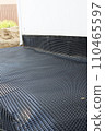 Drainage of water from the foundation of the house using a plastic membrane. 110465597