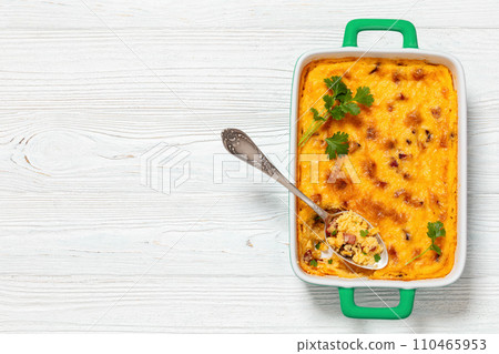 cheesy smoked sausage grits bake in ceramic dish cheesy smoked sausage grits bake in ceramic dish 110465953
