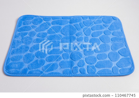 New bath mat isolated on white. Bathroom rug 110467745