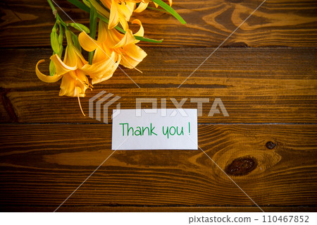 bouquet of beautiful yellow lilies on wooden table bouquet of beautiful yellow lilies on wooden table 110467852