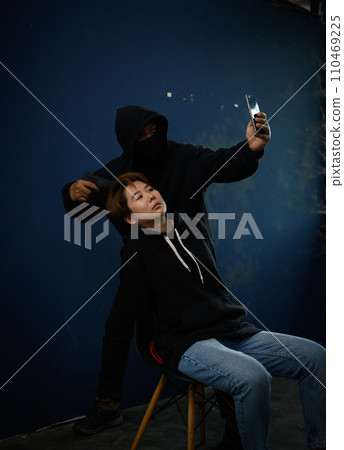 Man with gun threaten woman for call money hostage Man with gun threaten woman for call money hostage 110469225