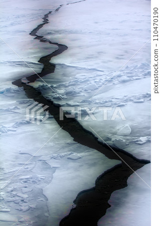 huge crack in ice of Arctic ocean 110470190