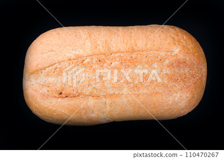 Large loaf of bread isolated on black Large loaf of bread isolated on black 110470267