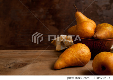 Pears on wooden background as background image.. 110470593