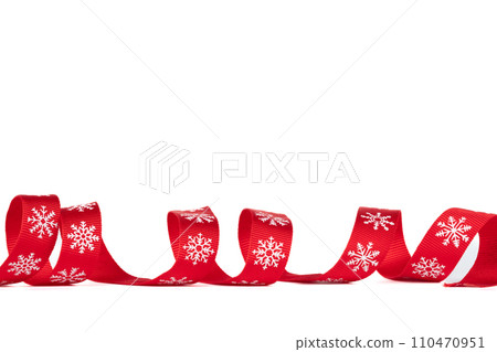 Christmas red ribbon twisted isolated on white background. Christmas red ribbon twisted isolated on white background. 110470951