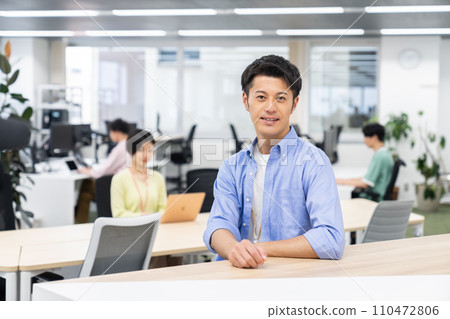 middle-class engineer in the office 110472806