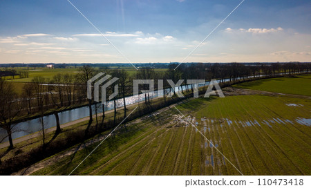 Sunbeam-Kissed River and Farmlands Sunbeam-Kissed River and Farmlands 110473418