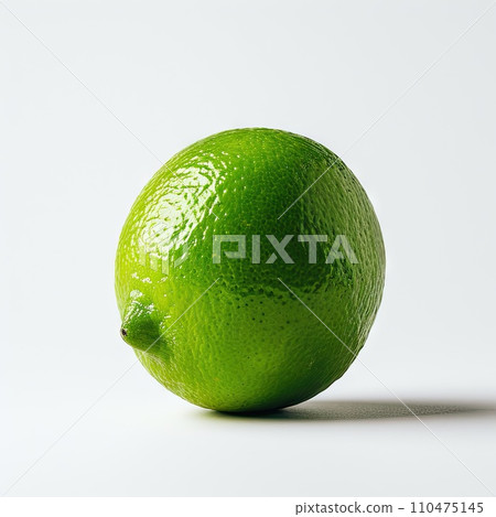 Close-up view of a whole fresh green organic raw lime 110475145