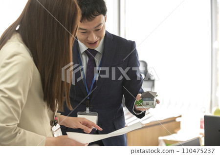 Business meeting scene between two men and women Business meeting scene between two men and women 110475237