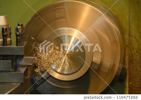 The turning machine operation with continue chip from turning process. 110475888