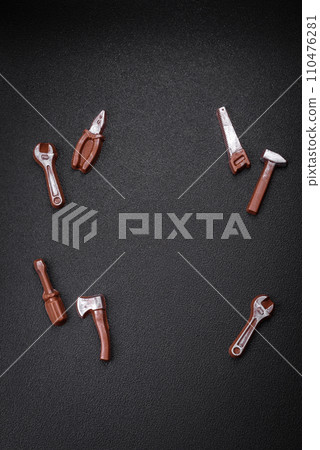 Tools and inscriptions symbolizing repairs or a garage and its attributes on a plain background 110476281