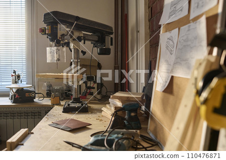 Close up background image of cutting machines and tools in carpenters workshop, copy space 110476871