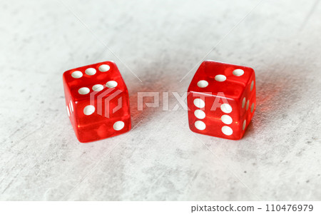 Two translucent red craps dices on white board showing Centerfield Nine / Nina (number 6 and 3) 110476979