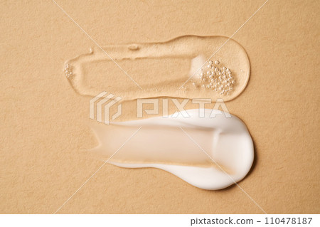 Cosmetic Gel and a cream on a beige background. 110478187