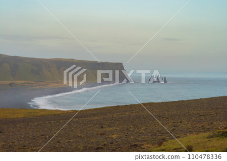 Wave of Black Sand Beach Reynisfjara in Iceland. Wave of Black Sand Beach Reynisfjara in Iceland. 110478336