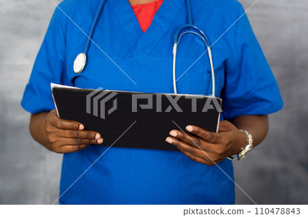 woman's hands holding a notepad woman's hands holding a notepad 110478843