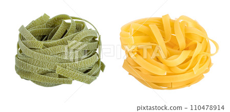 Raw tagliatelle green and yellow pasta with spinach isolated on white background 110478914