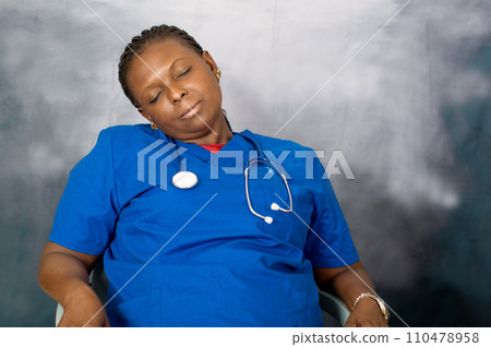 Female doctor sleeping at work 110478958