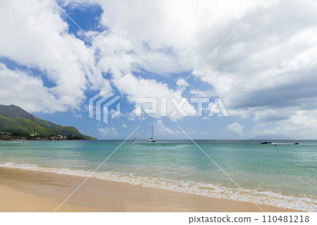 Summer landscape of Beau Vallon beach taken on a sunny day. Mahe island, Seychelles Summer landscape of Beau Vallon beach taken on a sunny day. Mahe island, Seychelles 110481218