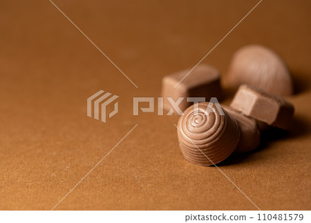 Chocolate candies close-up, pralines, truffles. Sugar addiction, copy space. 110481579