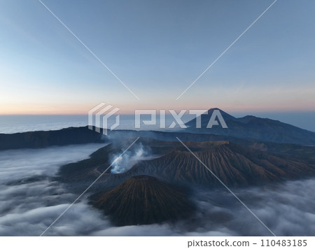 Aerial view Mountains at Bromo volcano during sunrise sky,Beautiful Mountains Penanjakan in Bromo Tengger Semeru National Park,East Java,Indonesia.Nature landscape background 110483185