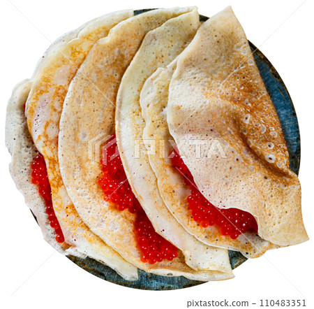 Crepes served in a plate with red caviar Crepes served in a plate with red caviar 110483351