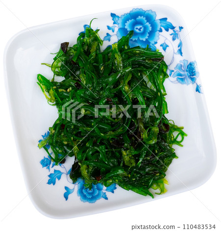 Asian style salad with marinated wakame seaweed served Asian style salad with marinated wakame seaweed served 110483534