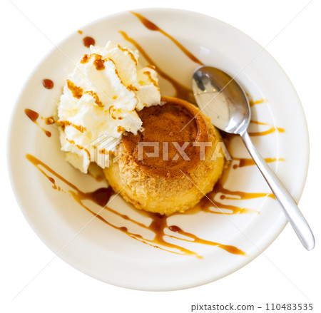 Creamy flan served on platter for dessert 110483535
