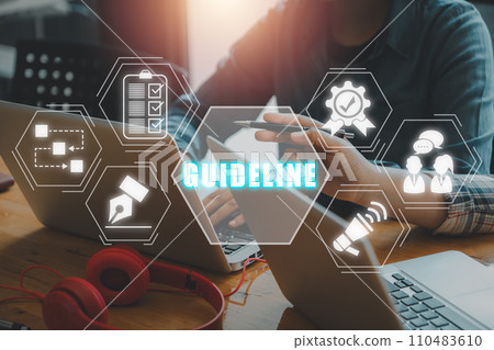 Guideline concept, Business team working on laptop computer on desk with guideline icon on virtual screen. 110483610
