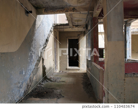 Inside of a falling apart building Inside of a falling apart building 110483674