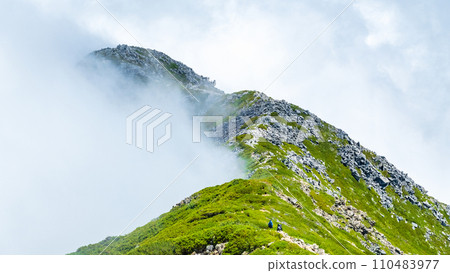 Climbing Mt. Jonendake in summer (Mt. Jonendake - Mt. Jonendake: rising clouds) 110483977