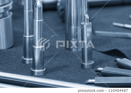 Close up scene the press die and injection mold standard parts. 110484487