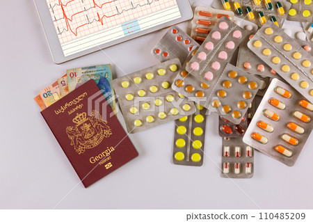High quality, expensive treatment in Georgia is to have Georgian passport, lari banknote, medicine pills capsules 110485209