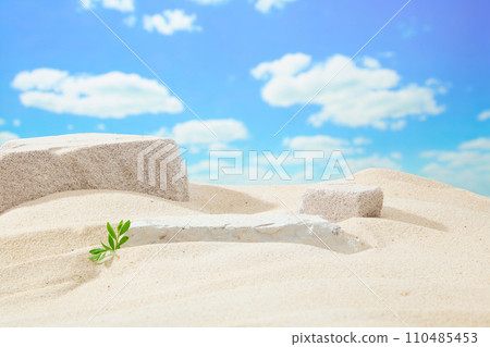 Gray blocks of stones on white sand on blue sky background. Simulate beach nature scene. Minimal background for cosmetic or product presentation. Front view 110485453