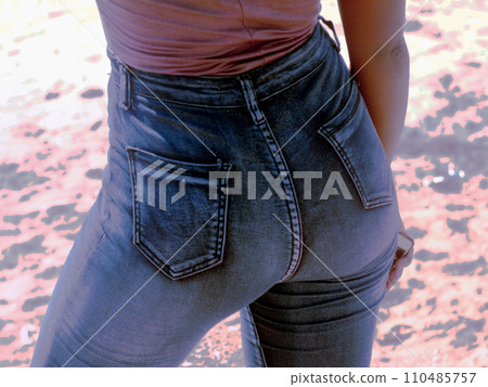 woman standing on beach woman standing on beach 110485757