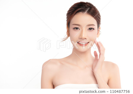 Beautiful young asian woman with clean fresh skin on white background, Face care, Facial treatment, Cosmetology, beauty and spa, Asian women portrait. Beautiful young asian woman with clean fresh skin on white background, Face care, Facial treatment, Cosmetology, beauty and spa, Asian women portrait. 110487756