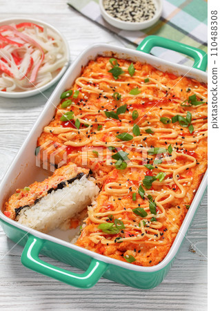 sushi bake with salmon, rice, seaweed, crab meat 110488308