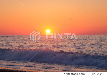 Sunset over the sea 110488348