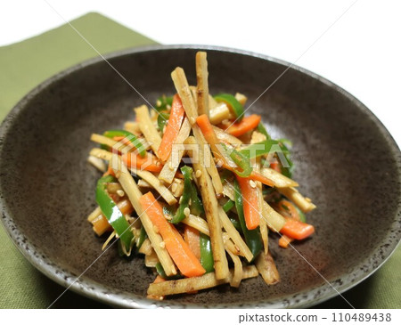 Delicious Kinpira burdock with green pepper Delicious Kinpira burdock with green pepper 110489438